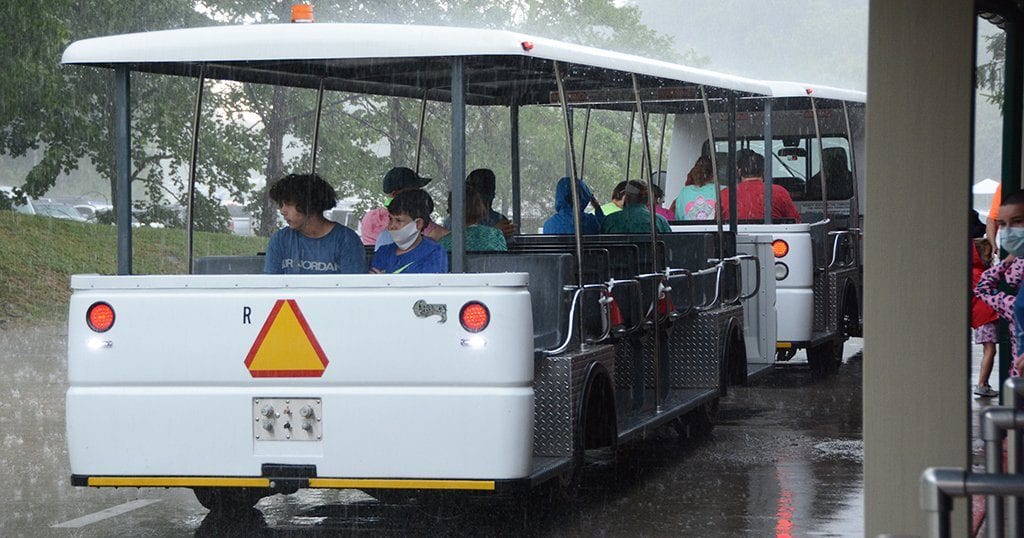 Guests riding the tram on opening day